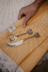 cheese knife and bottle opener brass